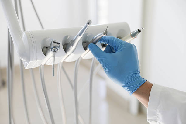 Professional Tooth Extraction technician working in Clear Lake, IA